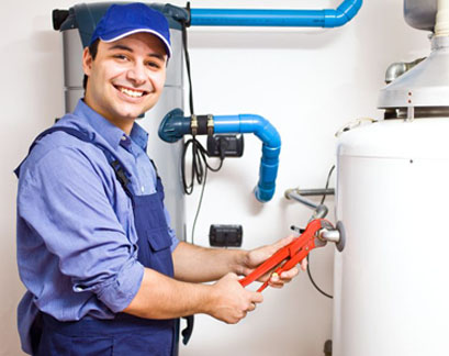 Repair man fixing furnace with wrench